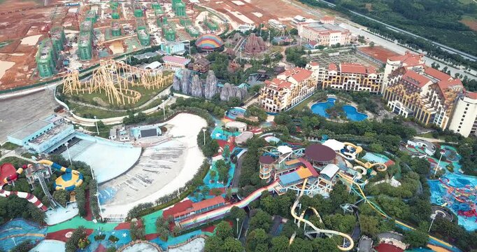 Aerial Amusement Park Resort With Roller Coasters and Water Slides
