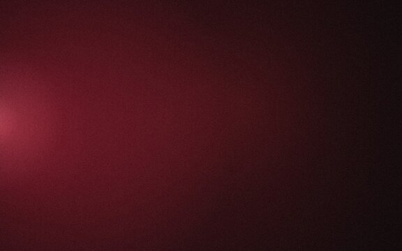 Abstract dark red background with a soft light glow fading into deep shadows for creative graphic design