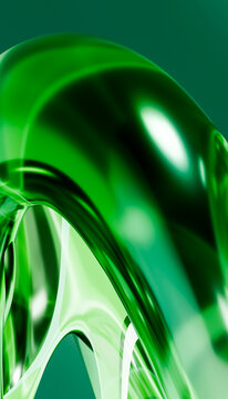 Abstract green glass sculpture with smooth curved surfaces