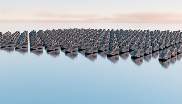 Pairs of grey shoes arranged in rows on a reflective surface