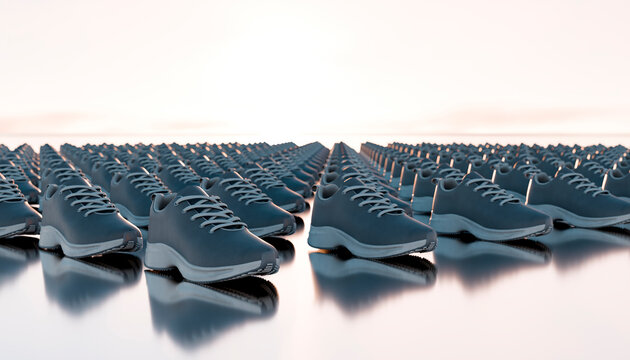 Rows of blue sneakers with white soles on a reflective surface