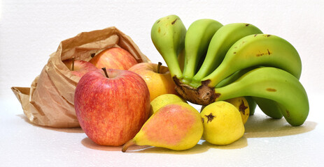 Assorted, healthy fruits on a white background. © Juan Antonio 