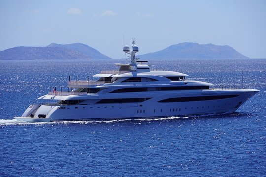 A luxury motor yacht near the coast of Vouliagmeni in Attica, Greece