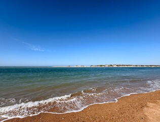 view from the Playa de Sancti Petri over the Cano de Sancti Petri to the dunes of Playa de Camposoto, vacation, Chiclana de la Frontera, Cadiz, Andalusia, Spain © keBu.Medien