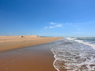 wide sandy Playa de Camposoto between the Atlantic Ocean and the Cano de Sancti Petri near Cadiz and San Fernando, Andalusia, Spain © keBu.Medien