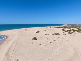 aerial view of the wide sandy Playa de Camposoto between the Atlantic Ocean and the Cano de Sancti Petri near Cadiz and San Fernando, Andalusia, Spain © keBu.Medien