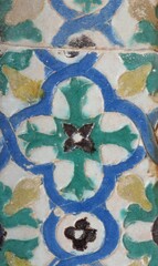 Old hand-painted ceramic tiles with blue and green floral pattern