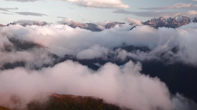 Kackar Mountains in Rize Turkey rise above clouds drifting through high altitude valleys. Eastern Black Sea ridges glow over misty slopes in a serene upland landscape.