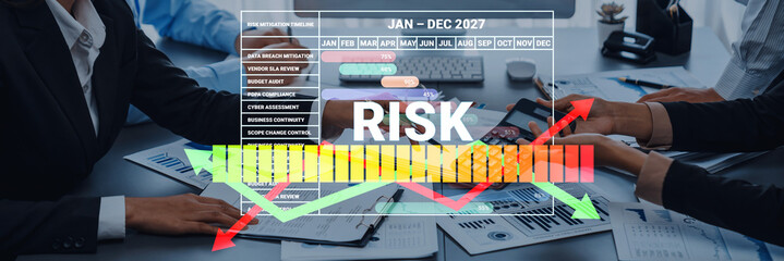 Fototapeta premium Business Meeting Analyzing Risk Management Data with Graphs and Charts for the Year 2027 in a Modern Office Environment. Sentient.