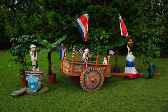 Traditional Costa Rican Painted Oxcart Display in Garden