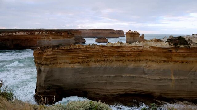 Razorback eroded limestone rock off Great Ocean Road marine park coast in Australia Twelve Apostles.