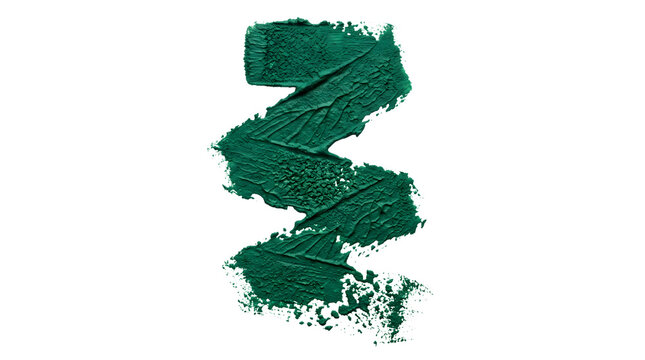 Dark green creamy cosmetic smear swatch isolated on white.