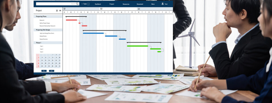 Project planning software for brisk business project management on the computer screen showing timeline chart of the team project