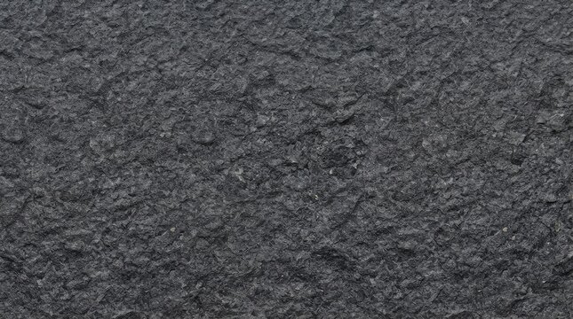 Dark gray rough textured stone background