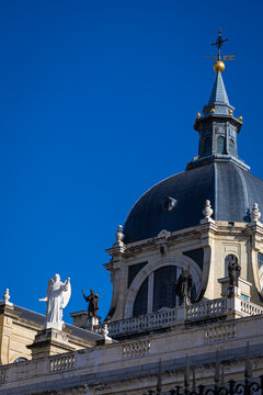 Almudena Cathedral Exterior with Dome and Statues in Madrid Spain