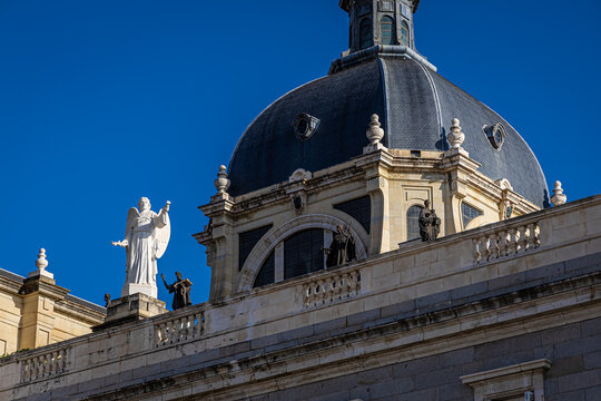 Almudena Cathedral Exterior with Dome and Statues in Madrid Spain