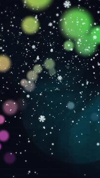 Animation of snowflakes icons falling over colorful spots of light against black background