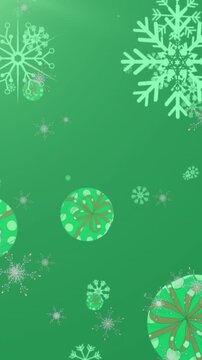 Animation of snowflakes and decorative bauble icons falling against light spot on green background