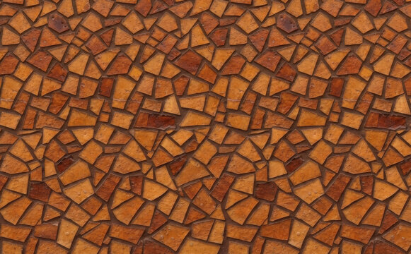 Orange mosaic tile stone wall background texture, abstract irregular masonry pattern for architectural design and modern interior decoration