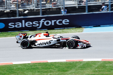 Obraz premium May 24, 2026, Montreal, Canada, Esteban Ocon races a Haas F1 car at Circuit Gilles-Villeneuve. g.