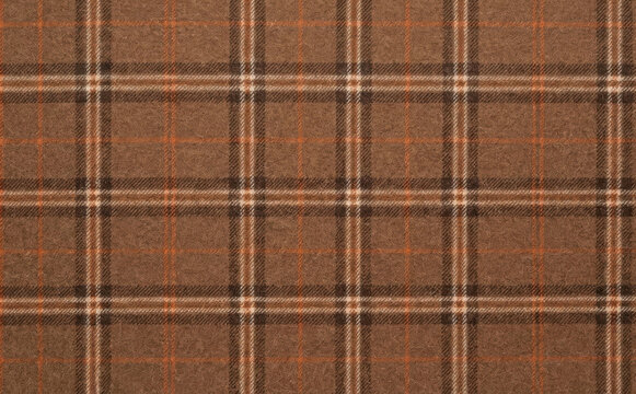 Brown plaid wool fabric texture background with checkered tartan pattern for winter fashion apparel and cozy interior design projects