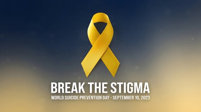 Yellow ribbon with the words break the stigma on a blurred background