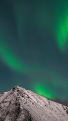 Northern lights phone wallpaper background, Lofoten island in Norway © Rawpixel.com
