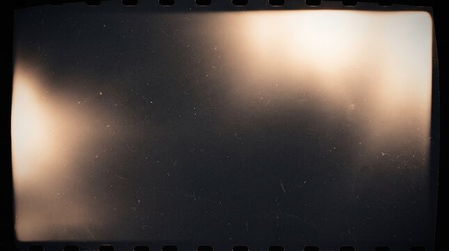  Aged celluloid film frame with sprocket border, matte vignette, abrasion marks and emulsion dust. Vintage negative scan overlay texture background for design