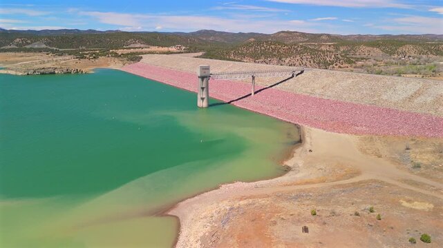 Drone pullout reveals Trinidad Lake dam and exposed shoreline