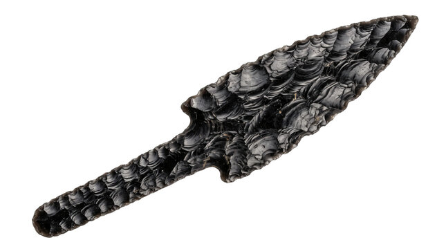 Obsidian knife blade isolated on white background. Prehistoric tool weapon artifact