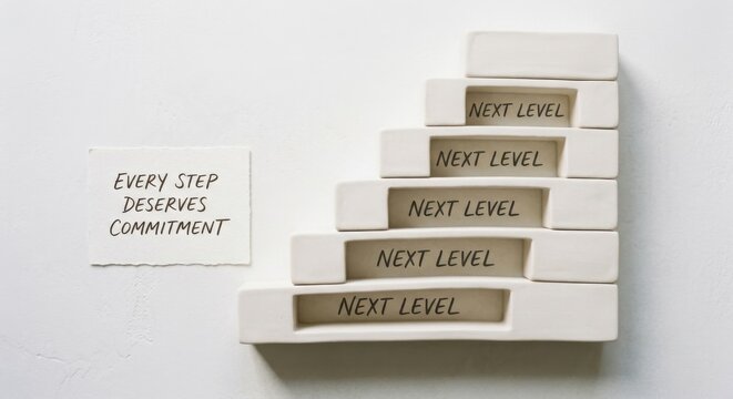 Ascending Staircase of Ceramic Blocks Displaying 'Next Level' Messages