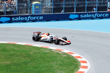 Fototapeta premium May 24, 2026, Montreal, Canada, Esteban Ocon races a Haas F1 car at Circuit Gilles-Villeneuve. g.