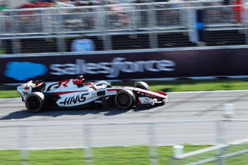 Fototapeta premium May 24, 2026, Montreal, Canada, Esteban Ocon races a Haas F1 car at Circuit Gilles-Villeneuve. g.