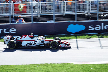 Fototapeta premium May 24, 2026, Montreal, Canada, Esteban Ocon races a Haas F1 car at Circuit Gilles-Villeneuve. g.