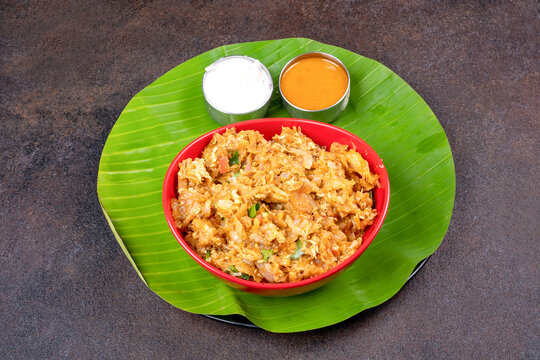 Spicy shredded kothu parotta with Indian flavors