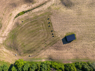 Fototapeta premium Harvested Farm Field With Hay Bales in Ontario