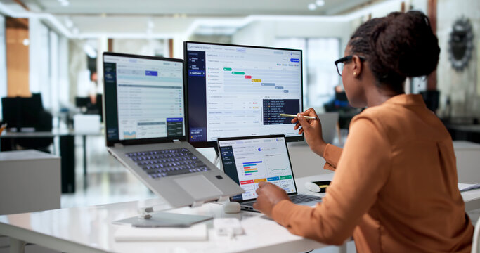 Banking Manager Carefully Analyzes Digital Financial Transactions