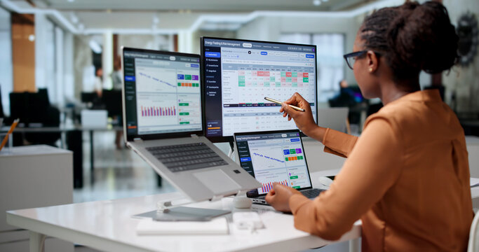 Energy Trader Woman Analyzes Risk Data Carefully