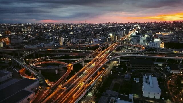Dramatic Sunset Over Osaka Highway Junction and Cityscape, Japan 4K  ,1 (大阪の高速道路ジャンクションと都市に沈む夕日 4K)