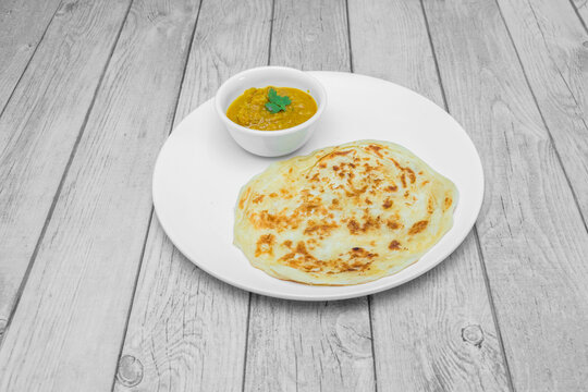 South Indian parotta served with vegetable kurma