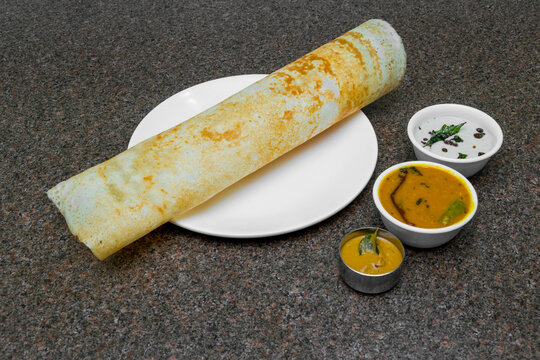 Traditional plain South Indian dosa with chutneys