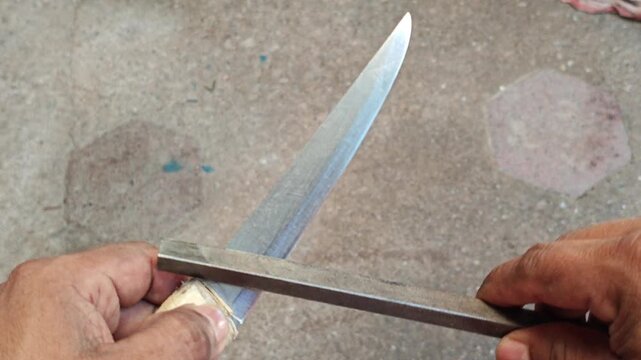 Sharpening Knife Blade Edge Using Metal File Tool Handwork