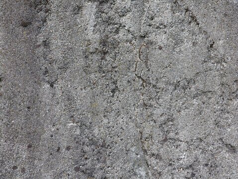 Old, weathered gray rock. Rock background.
