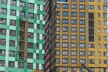 Fototapeta premium Modern architecture blends with color and form in a bustling urban construction site