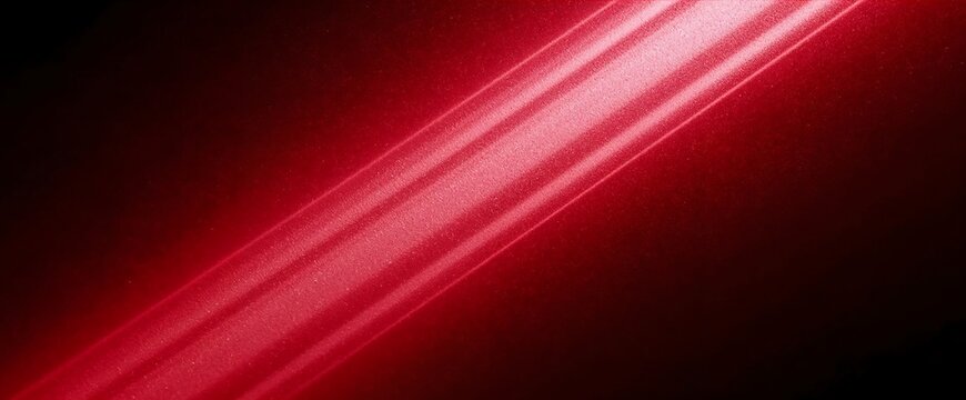 Abstract red light streak on dark background with motion blur glowing line diagonal line light effect speed motion