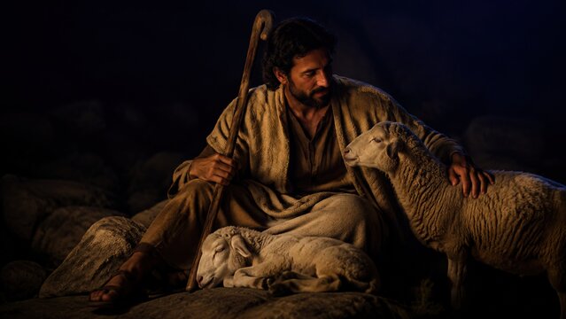 Man shepherd sitting on rocks with staff and sheep at night. Good shepherd caring for his flock with love and protection. Biblical parable of Jesus the good shepherd who lays down his life for