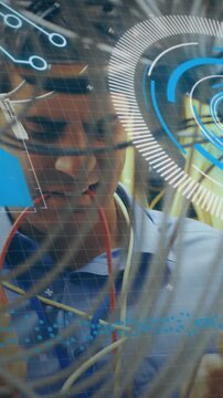 Animation of digital interface over caucasian server room worker