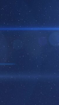Digital animation of two glowing spots of light against with copy space on blue background