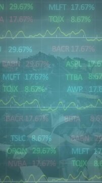 Animation of multicolored trading board over aerial view of rocks on ground against sky