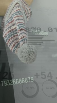 Animation of changing numbers, graphs, trading board, clothes hanged on hook at home